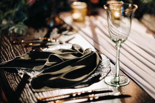 Wedding table decoration on the table in the castle, Cutlery on the table