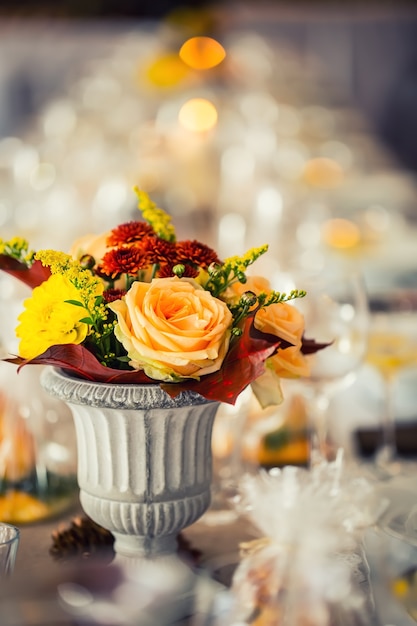 Wedding table. Flowers arrangement bouquets as decoration for wedding.