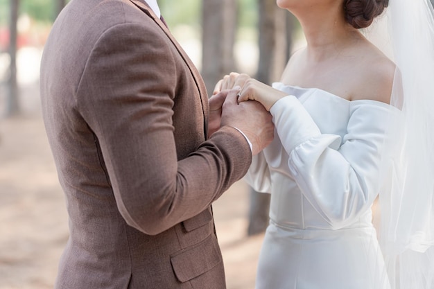 Wedding theme background holding hands newlyweds in celebration marriage day