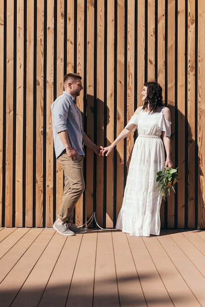 Wedding walk in the pine forest. Sunny day