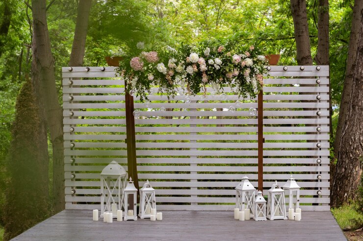 Wedding Wedding ceremony Arch Arch decorated with white flowers standing in the woods in the wedding ceremony area Wedding day