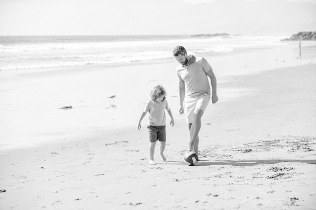 Weekend family day dad and child having fun outdoors childhood and parenting