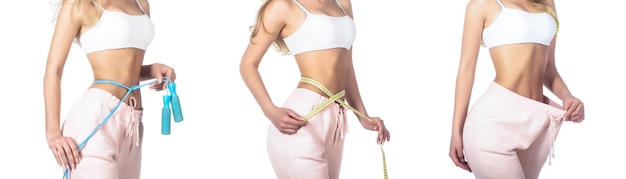 Weight loss concept Slim girl with centimeter Closeup woman measuring her waist with tape Slim woman's body Woman shows weight loss Slim body jump rope Girl a jump rope in hands Slim girl