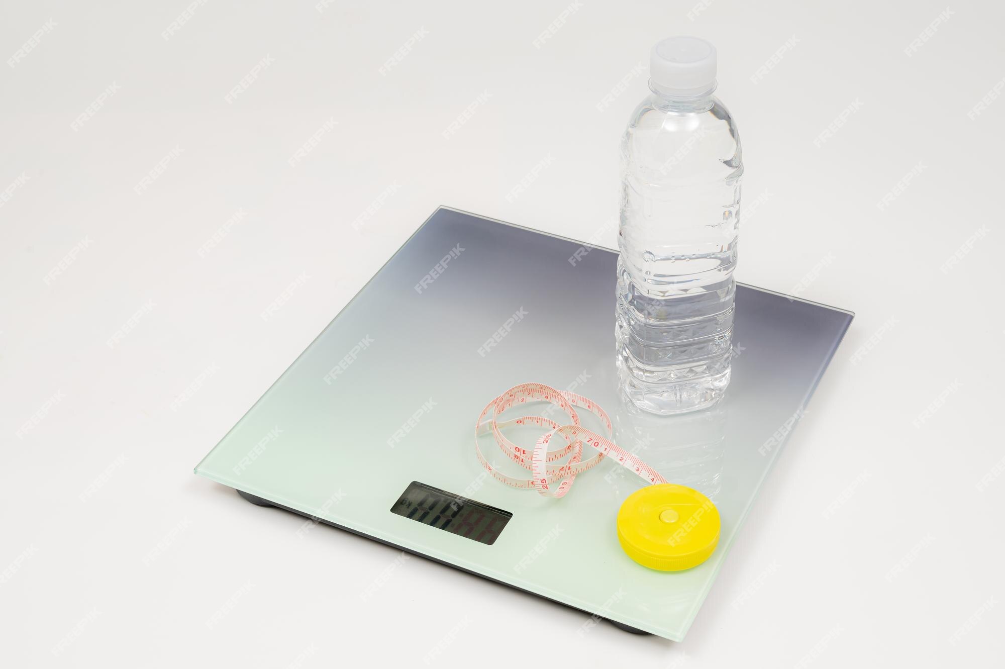 https://img.freepik.com/premium-photo/weight-scale-tape-measure-water-bottle-isolated-white-background_127345-1618.jpg?w=2000