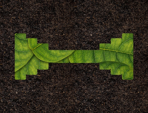 Тяжелая атлетика форма зеленых листьев на концепции экологии фона почвы