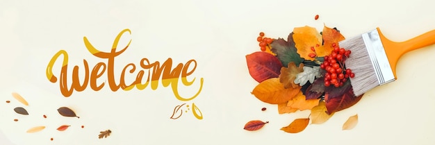 Welcome banner brush bright multicolored autumn leaves on neutral background