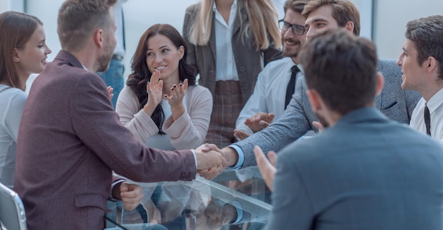 Welcome handshake of business people at a meeting in the office