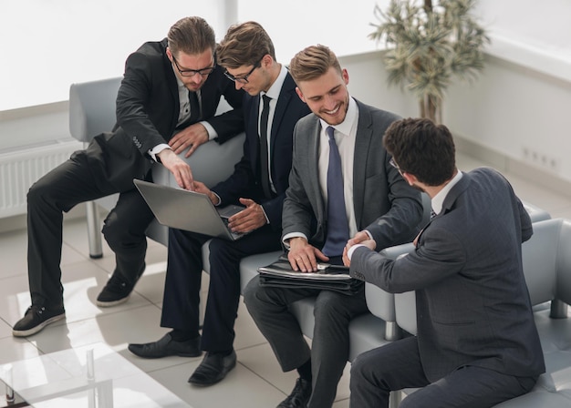 Welcome and handshake of business people in office waiting roombusiness concept