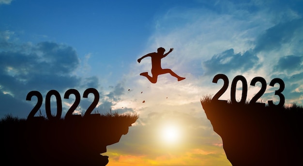 Welcome merry Christmas and Happy new year in 2023 with Man jumping