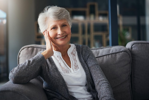 Welcome to retirement time to rest Portrait of a senior woman relaxing on the sofa at home