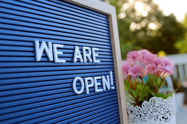 Photo welcome sign at the storebarrestaurant we are open