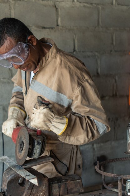 A welder during a day's work in the metallurgical factory.