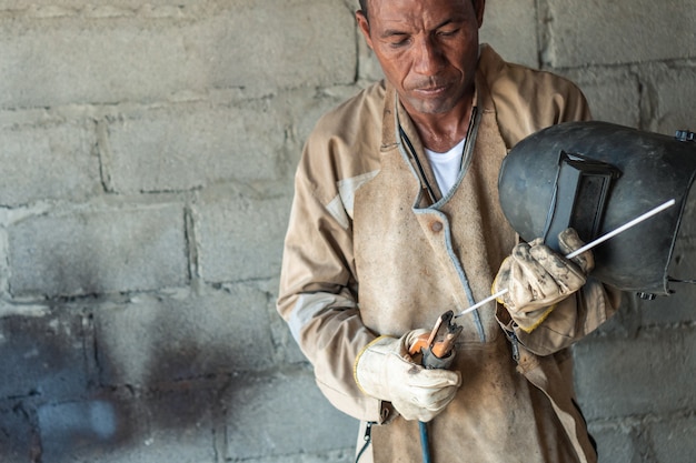 Welder At Work In The Factory