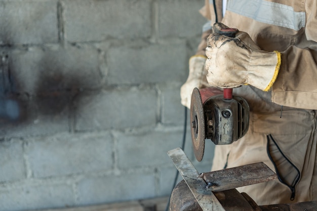 Photo welder at work in the factory