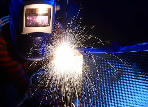 Welder working at the factory