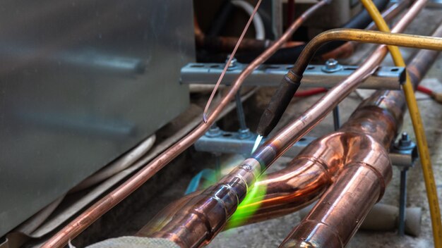 welding copper pipes with a gas burner