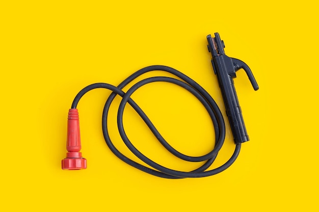 Welding equipment on yellow background