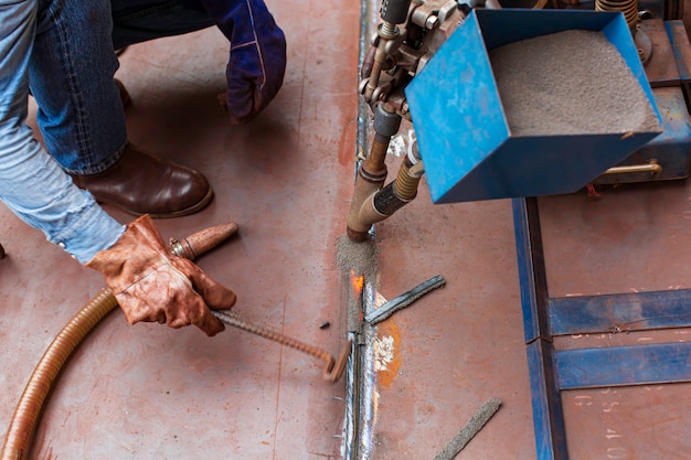 Welding hard surfacing of tank bottom plate steel roll by submerged arc welding process