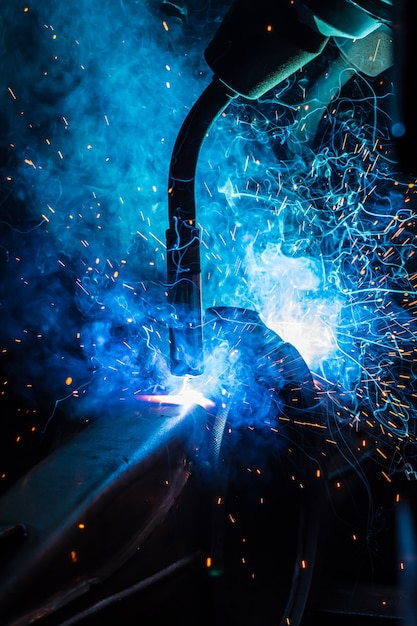 Welding robots movement in a car factory