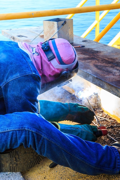 Welding sparks of welders in the offshore industry.