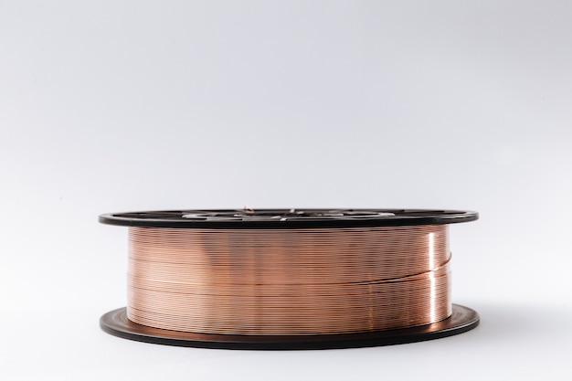 Welding wire spool on a white background