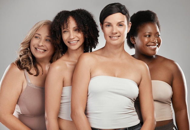 Well be together until the very end Shot of a diverse group of women standing close together in the studio and posing