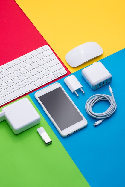 Well organised white office objects on colorful background