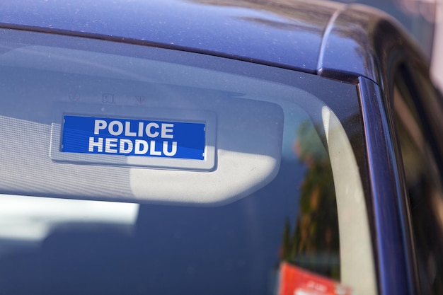 Welsh police sign on a sun visor