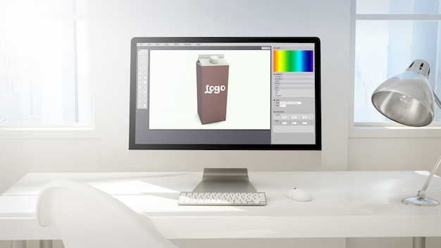 Werkruimte met computerscherm verpakking ontwerp doen