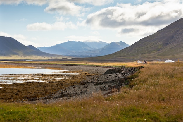 Western Icelandic sea coastline under a blue summer sky