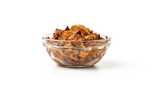 Photo wet food for cats and dogs in a bowl on a white background.