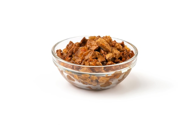 Wet food for cats and dogs in a transparent bowl on a white background.