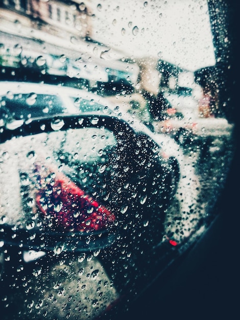 Wet glass window in rainy season