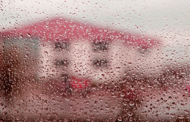 Wet glass with drops of rain fall