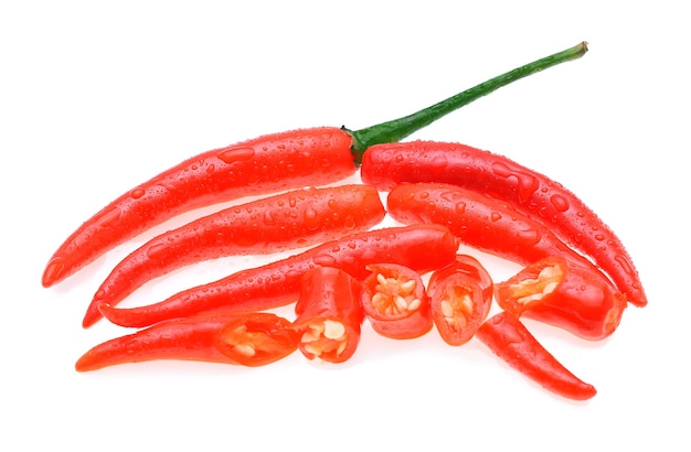 Wet red chili peppers isolated on white