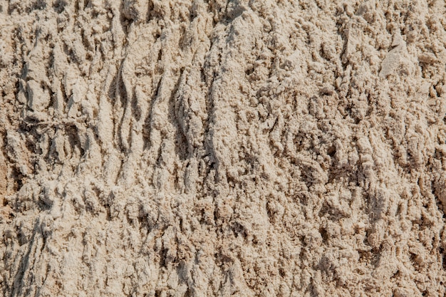 Wet sand texture at the beach