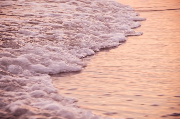 Wet sand at the time of sunset