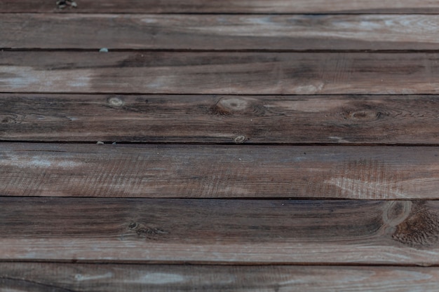 Wet wooden background. Unpainted boards. Rustic concept. Copy space