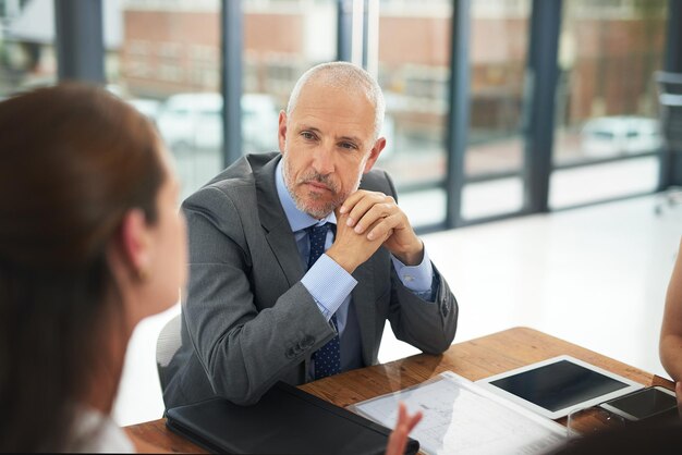 Photo what are you aims for this quarter shot of a group of businesspeople meeting in the boardroom