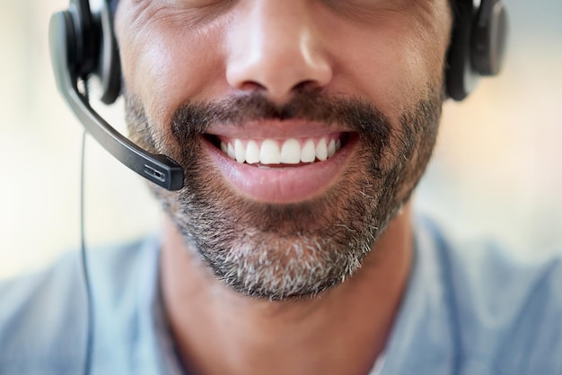 What can I do for you today Cropped shot of a call centre agent working in an office