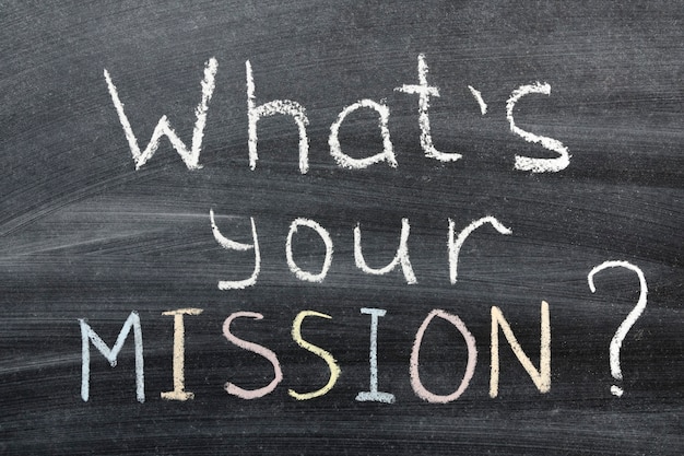 What's your mission? question handwritten on the school blackboard