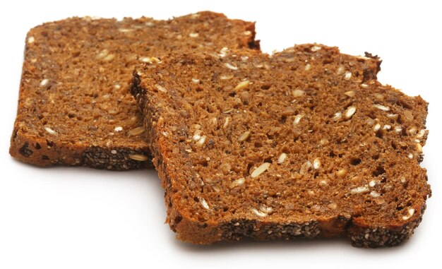 Wheat bread sliced over white background