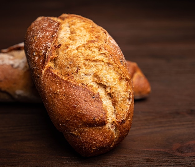 Wheat bread on wooden table