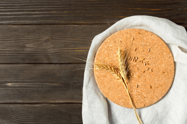 Wheat Ears on the Wooden Table