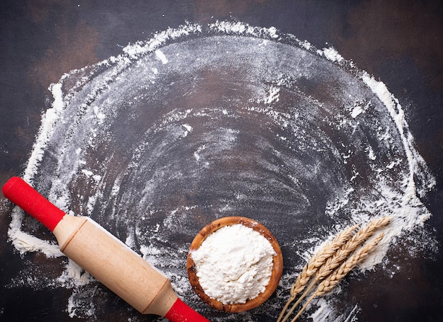 Wheat flour, ears and rolling pin 