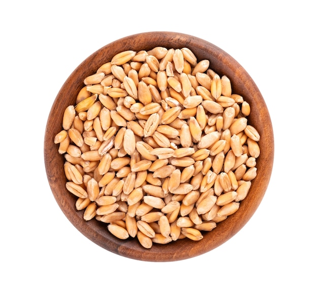Wheat grains in wooden bowl isolated