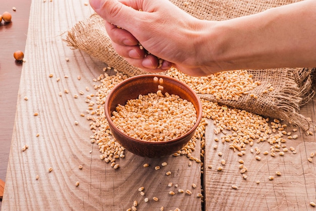 Wheat in hand pour