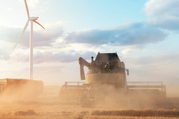 Photo wheat harvesting in the summer season by a modern combine harvester farmers securing food supply