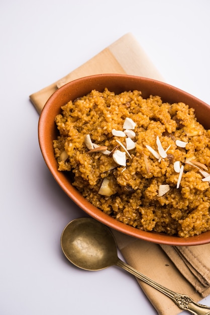 Wheat Laapsi or Lapsi or Shira or Halwa is an Indian sweet dish made of broken wheat or Daliya pieces and ghee along with nuts, raisins and dried fruits