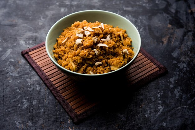 Wheat Laapsi or Lapsi or Shira or Halwa is an Indian sweet dish made of broken wheat or Daliya pieces and ghee along with nuts, raisins and dried fruits